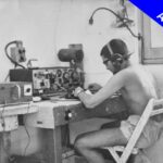 Photo of radio operator in shack