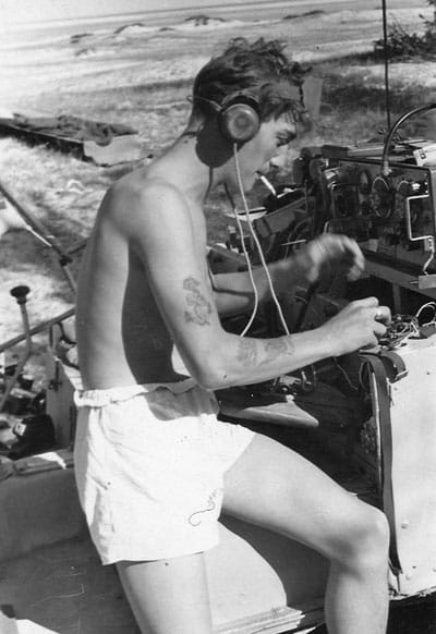 Bob ZL1AYN operating a WS19 radio set in the Persian Gulf, c1961