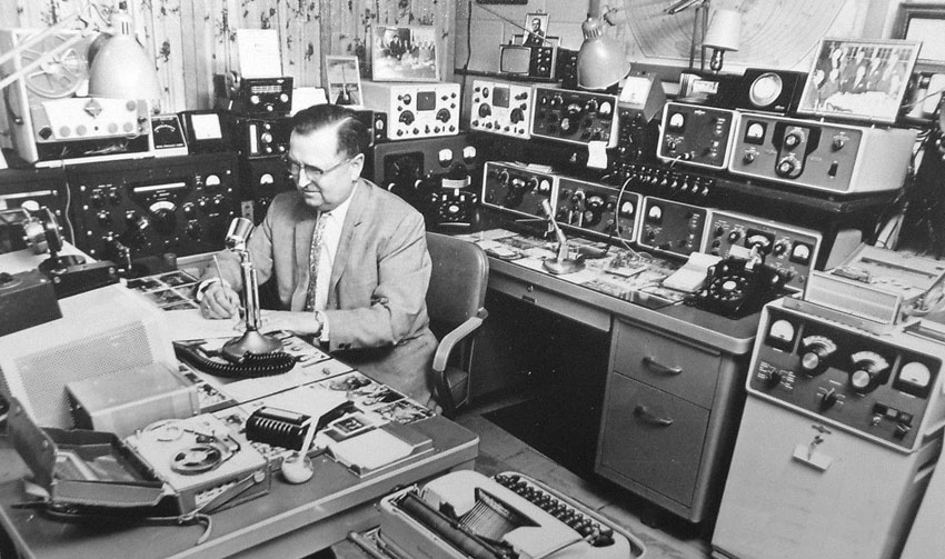 Felton Jenkins K0ZZR in his shack in Minneapolis, surrounded by Collins equipment, in the 1960s