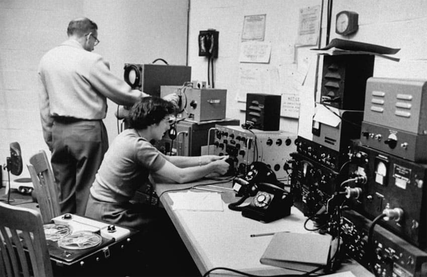 Scientists with radio equipment listening to Sputnik