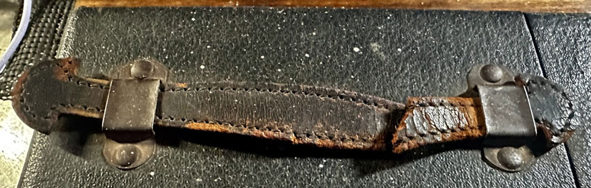 Broken leather strap on Vibroplex carrying case