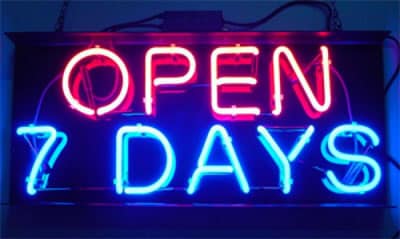 Neon sign says Open 7 Days