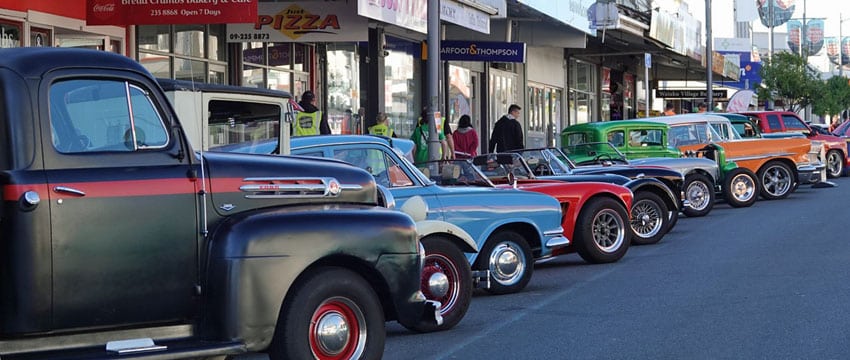 Hot rods angle-parked along main street of Waiuku during Steel and Wheels 2025