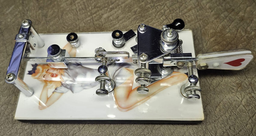 1951 Vibroplex Lightning bug with WW2-style pin-up girl image added