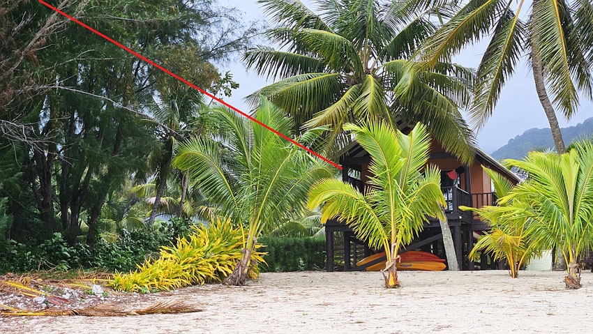 Photo of beach cottage with line showing location of end-fed radio aerial
