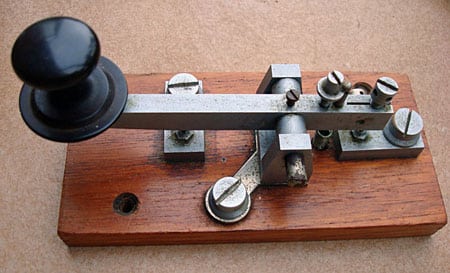 telegraph key on wooden base