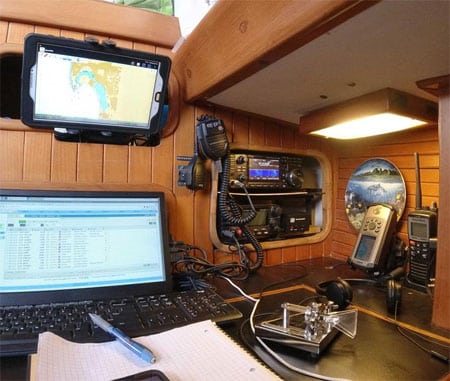 Chart table of sailing yacht with IC-7300 transceiver and Bencher paddles